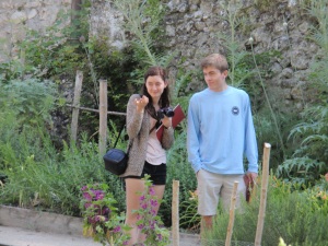 Rachel and John (Alex) stroll through the garden