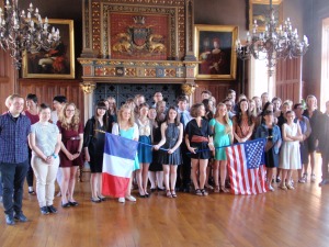 A group photo. Students held the American and French flags. Monsieur Goulet, the deputy mayor, is in the right of this photo.