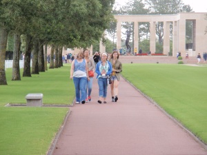 Christina, Ellen, Alex, and Lydia walk through the cemetery 