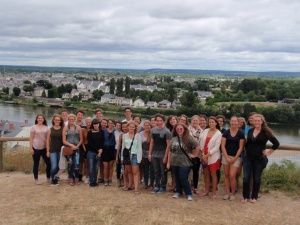 Students pose for a group photo overlooking Saumur from the Chateau